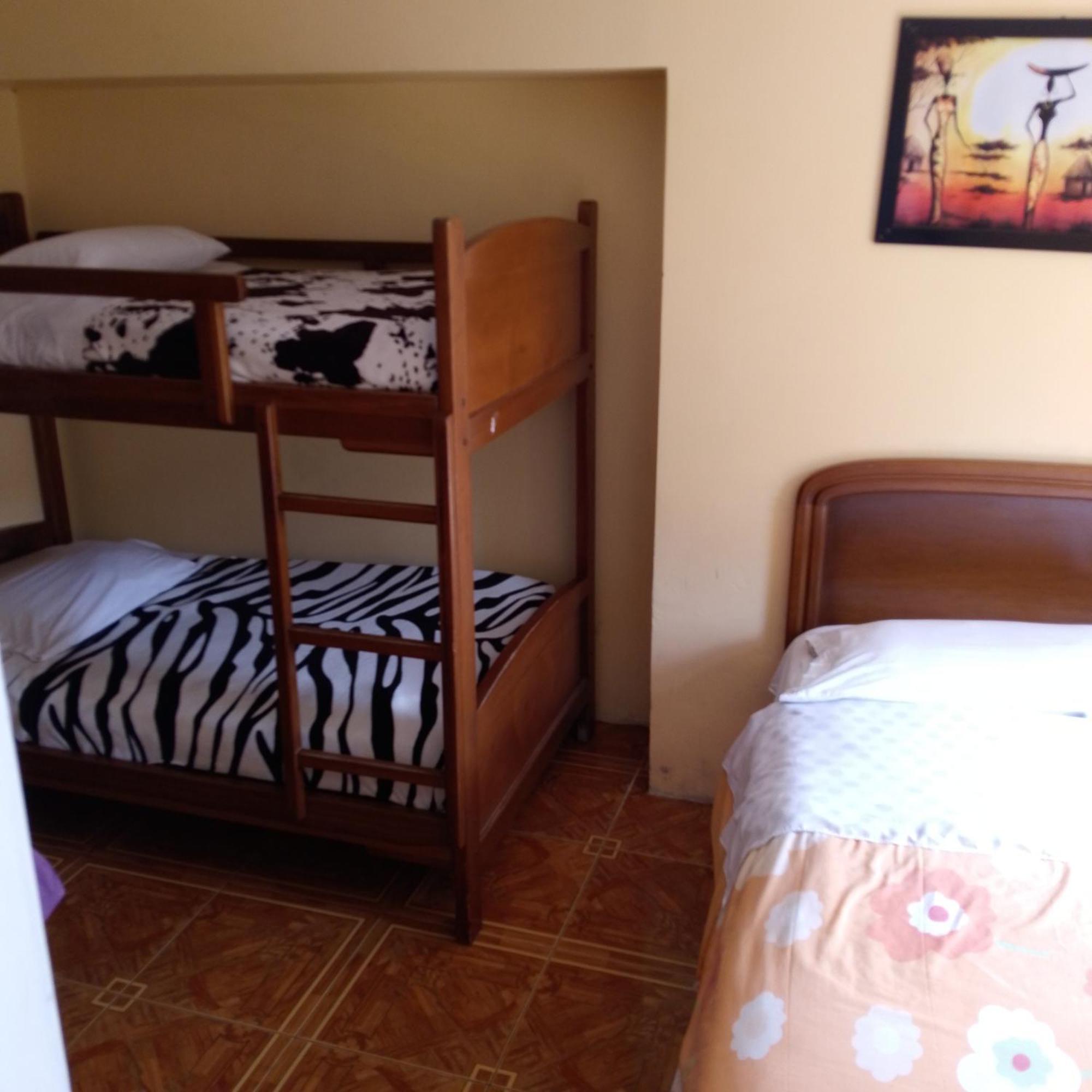 Hostal Amazonia y sol Baños Esterno foto